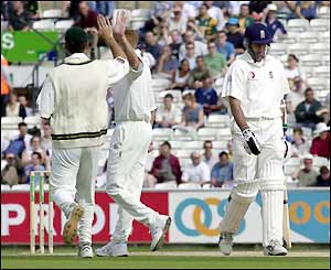 South Africa's Shaun Pollock celebrates as he dismisses Martin Bicknell in the first over of the day