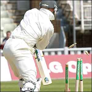 Herschelle Gibbs is bowled out by James Anderson