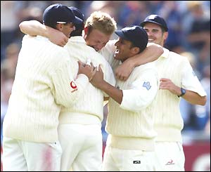 Andrew Flintoff is congratulated after removing Mark Boucher for 16