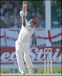 Brian Lara hits a lofted drive