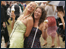 Two women standing in the mud at Ascot