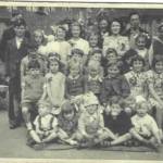 Taken in a "banjo" in Canonsleigh Road Becontree Dagenham during a party celebrating VE day. The families in the photograph include Walkinshaw, Wheatley, Jordon, Male, Wootten, Aubery, Bulmer, Monk, Cole,Ellis, Parker and Ginger. I would be very interested to know if anyone recognizes themself or there relations