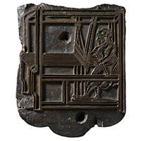 An 18th century wooden stamp