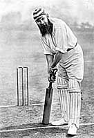 Black and white drawing showing British cricketer W G Grace at the crease