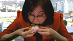 Li eating a burrito