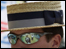 A man wearing a hat and sunglasses