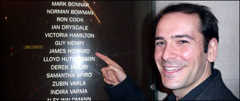 James points to his name in the credits