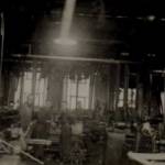 The machine shop, full of shafts and belt driven machines. Taken sometime in 1944