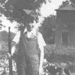 Peter Eley in his father's forage cap and holding his rifle. Pattiswick 1943