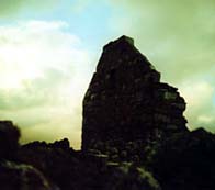 Phototgraph showing a silhouette of a ruined cottage