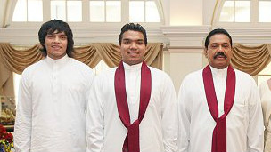 Rohitha Rajapaksa (L) with brother Namal and father, Mahinda (R)