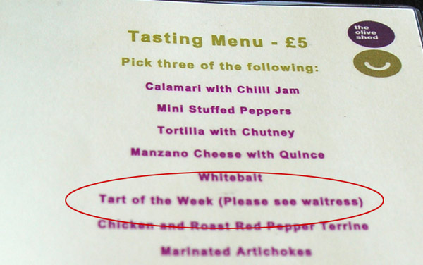 A menu saying 'tart of the week (please see waitress)'