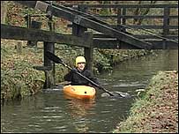 Canal and man in canoe