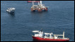 Работы по очистке залива от нефти