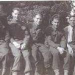 Fred centre with four others of our gun crew, the guy with the cap on was our corporal, a camera man at Ealing Studio in civi street. Waiting for demobilisation.