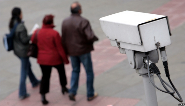 CCTV camera observes passers-by
