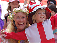 child wearing an english flag