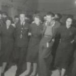 On Leave in Port Said, Egypt, in 1948. I could always find a dance. The WVS ran this one and I am the chap in the middle with the flapping jacket, I never conformed. The ladies on either side were Miss Mary Coatson and Mrs O'Neal. Those wonderful WVS ladies made our leave very enjoyable, I remember them with love. They danced my feet off for a change.