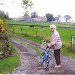 Doreen outside Park House Farm sixty years on