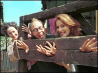 Three people in stocks