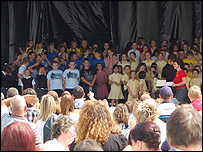 Crowds watch a performance