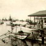 Japanese Boats with British fleet in background.