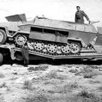 Capt Bond with German half-track