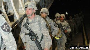 US troops boarding a plane to leave Iraq
