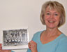Frances Trinder with a photograph of Shepherd's Bush Football Team, showing her great uncle Charles Audley seated front left