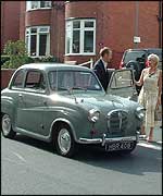 Stars getting out of car
