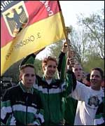 A marbles team celebrating