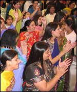 Devotees singing and dancing