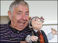 Tom with doll