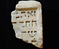 Fragment from a gravestone
