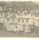 This is a photograph of my mother in Tengeru, with other girls in the orphanage as Polish brownies. She is kneeling down in the second row, second from the right.