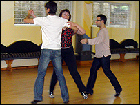 Darren Bennett instructs Karen Buchanan and her partner Aaron
