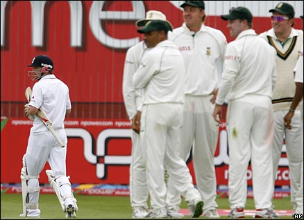 Paul Collingwood walks off as the South African fielders celebrate