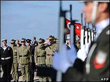 Turkish and Australian soldiers celebrate Anzac Day
