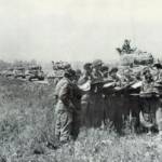 Tank Commanders of the 1st Polish Armoured Division, receive battle orders Falaise, 17th August 1944. Mietek Herman fourth from left.