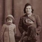 Margaret Kelly (nee McGowan) in 1941, with her Mother, Cassie (Catherine), and Brother, Dennis, sitting on Mother's knee