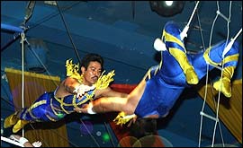Picture: The Rodgels flying on the trapeeze in the roof of the Hippodrome Circus
